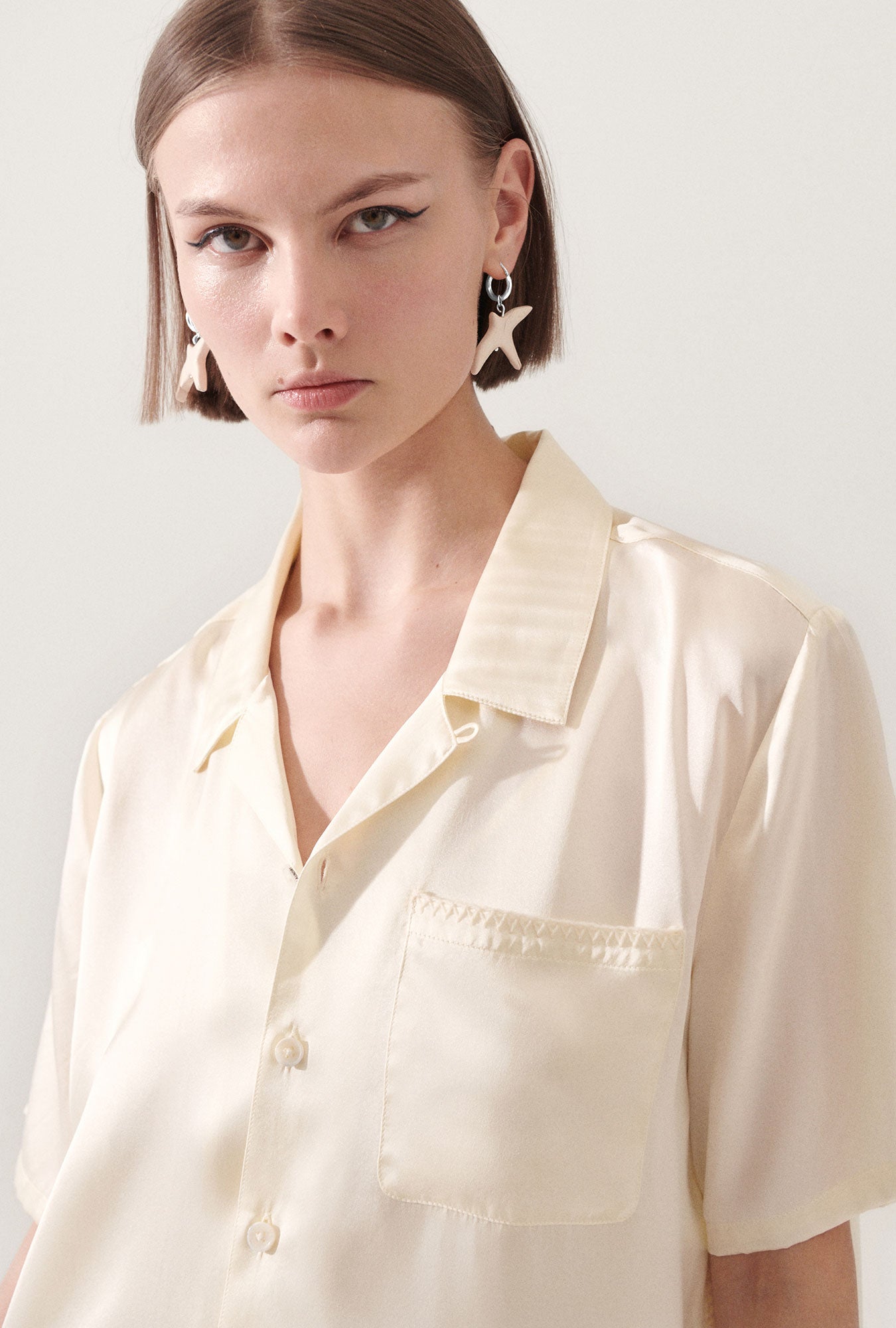 Boucles d'oreilles corbeau blanc