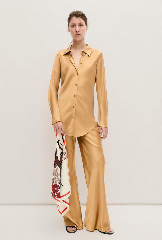 Chemise en biais avec cauris
