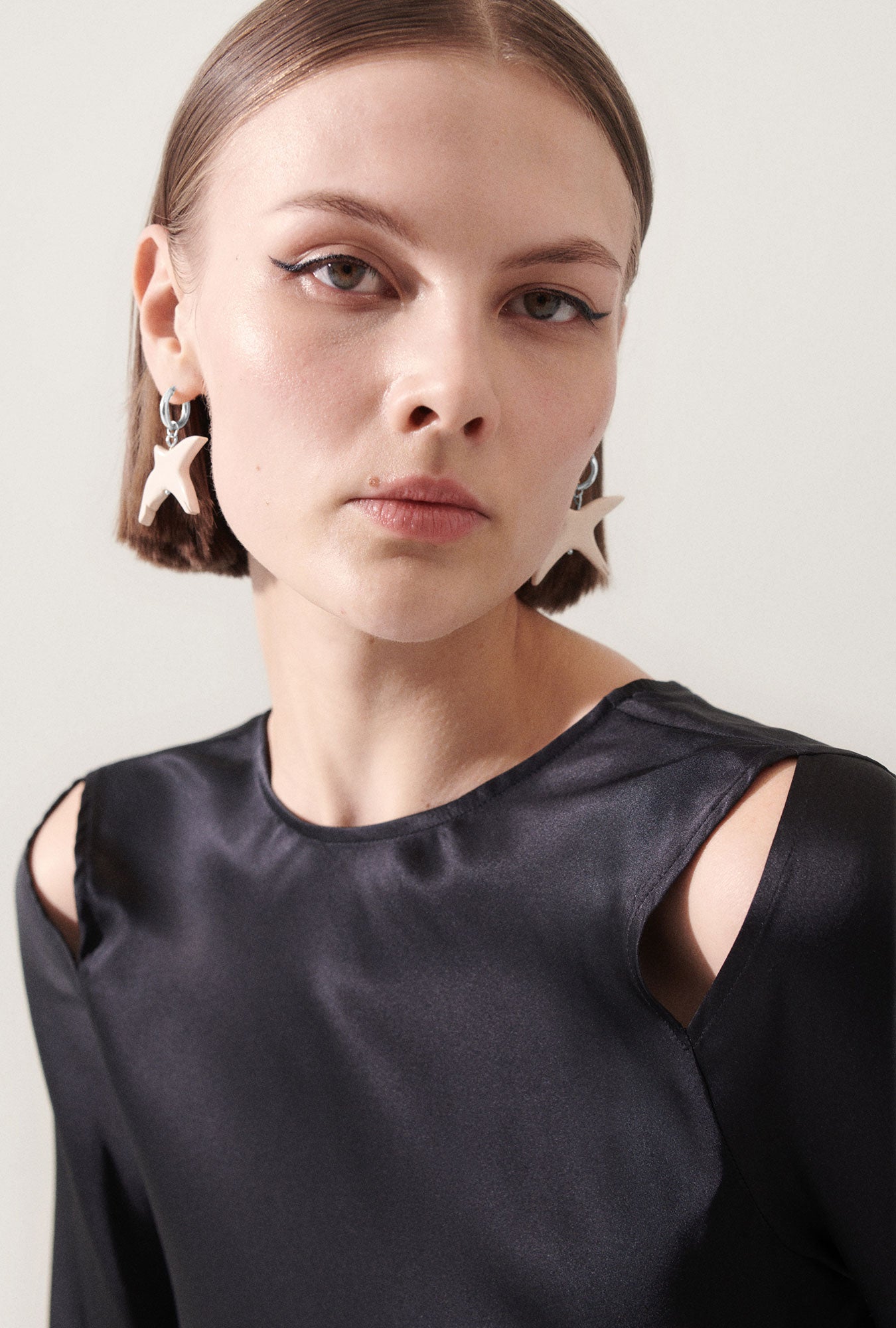 Boucles d'oreilles corbeau blanc
